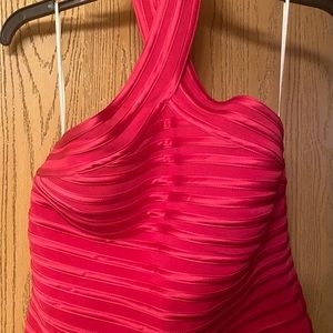 Just in time for New Years Eve… Women’s elegant halter top. Diamond buttons.